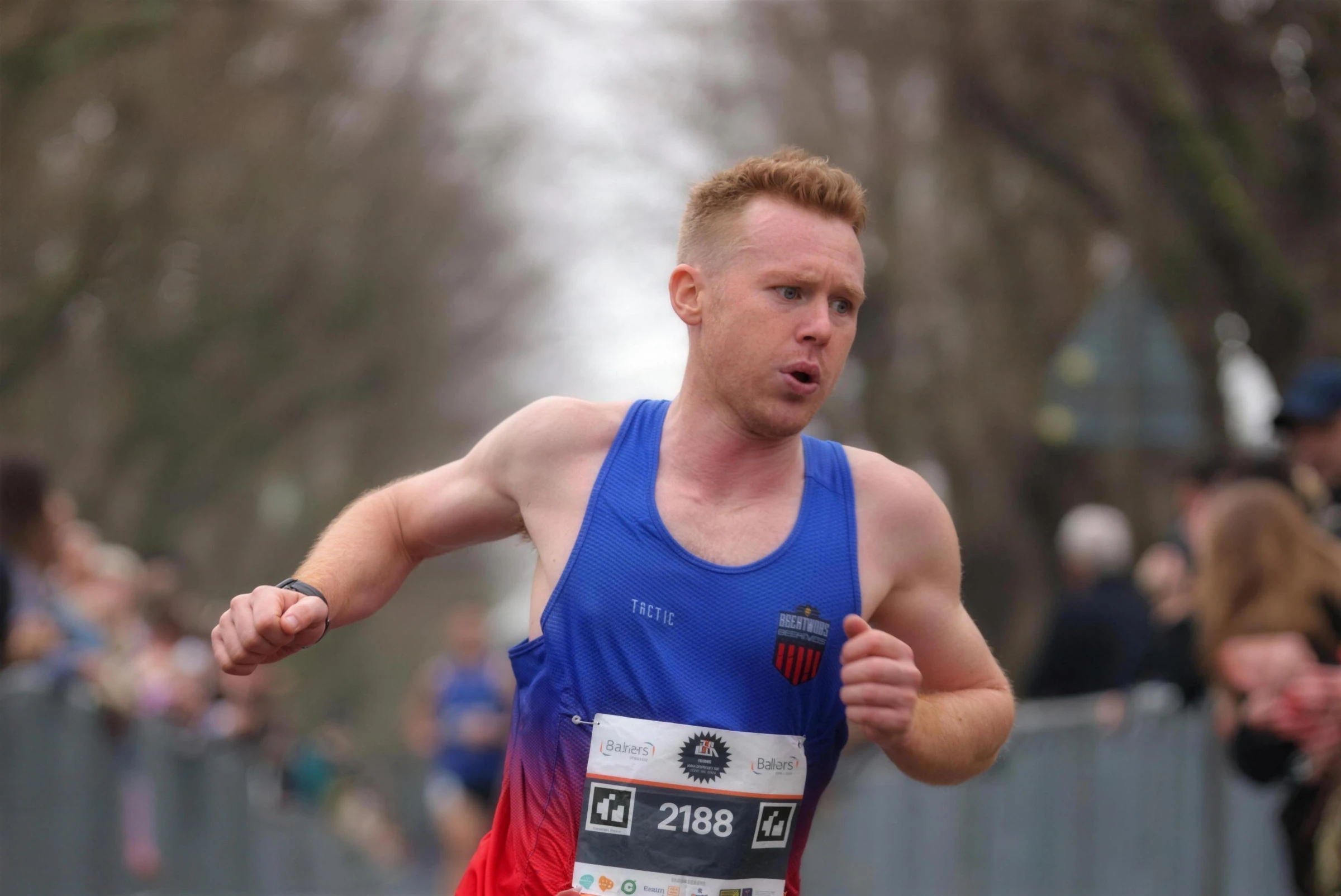Scott Brooks of Brentwood Beagles racing in the blue and red club vest at the Brentwood Half Marathon, March 2025
